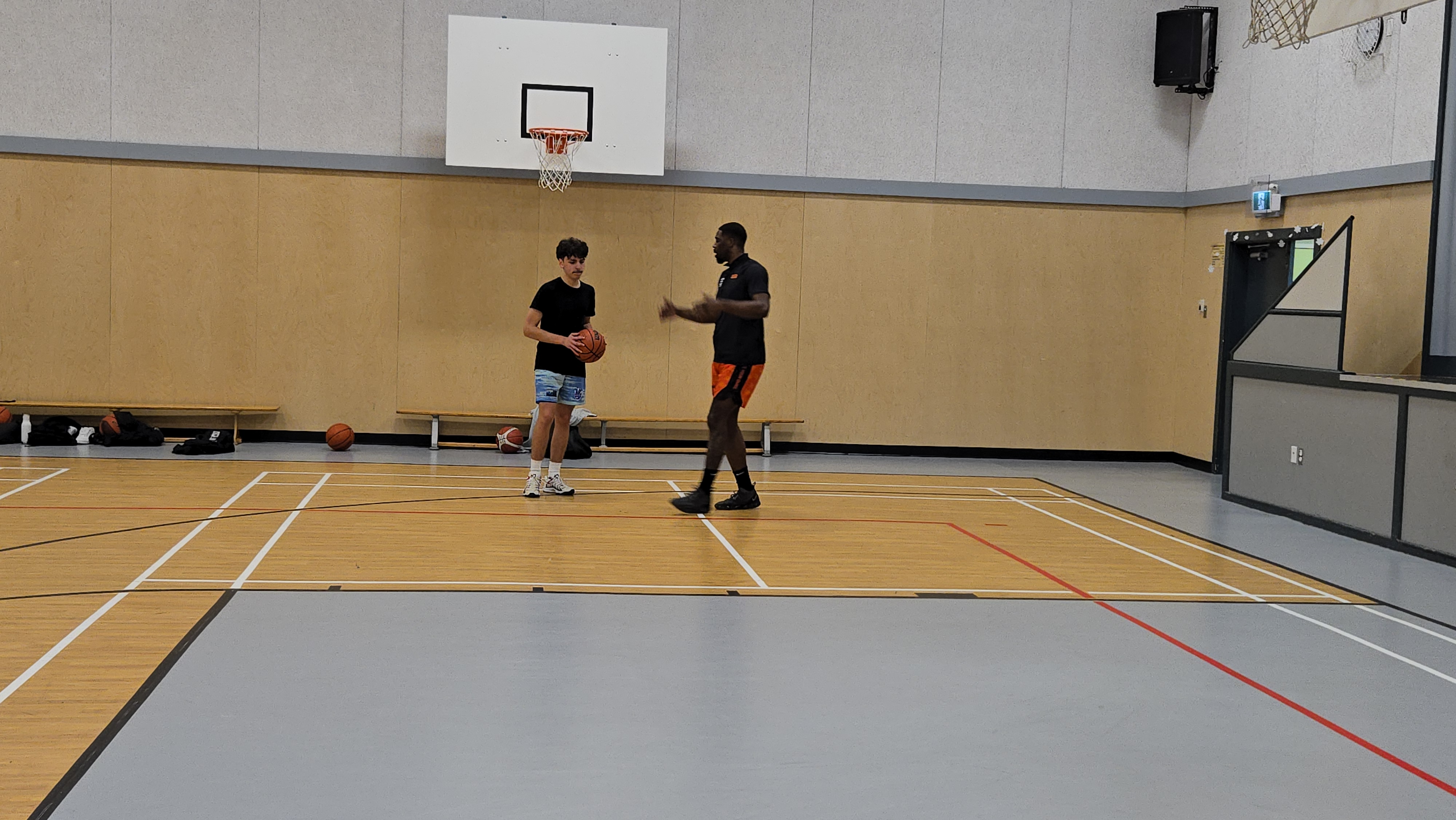 An Eagles player in a one-on-one training session with a coach